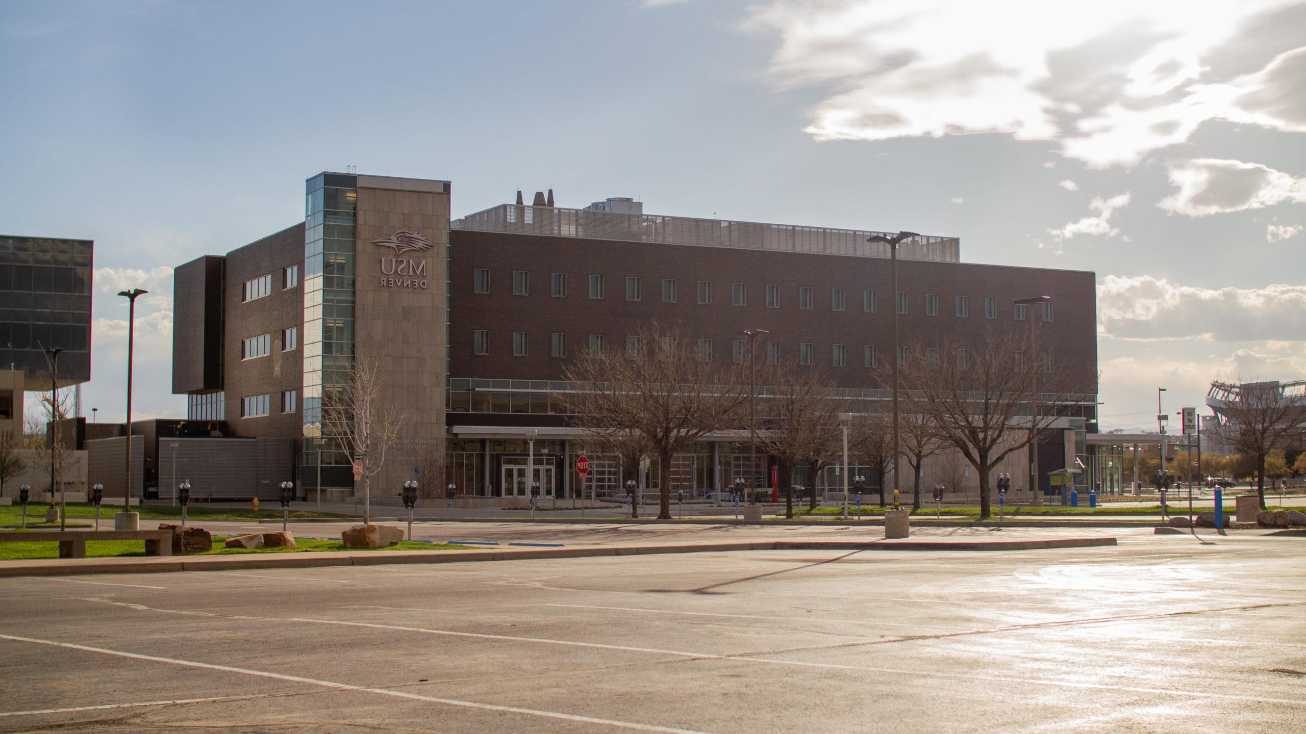 photo of campus with sun