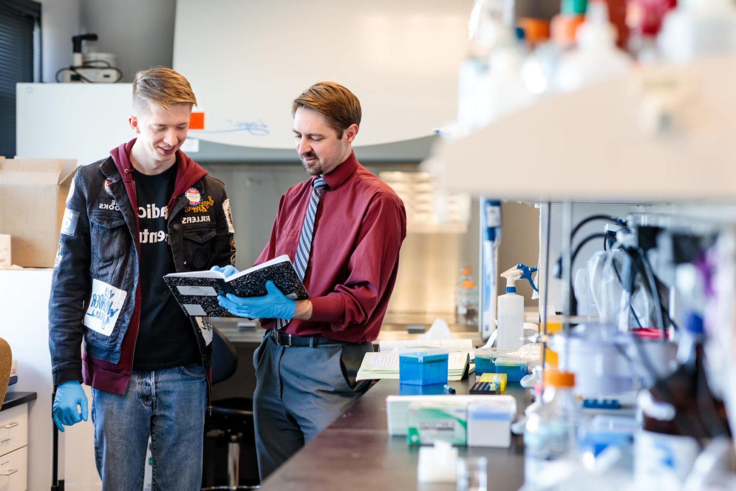 Professor Bonham working with a student.