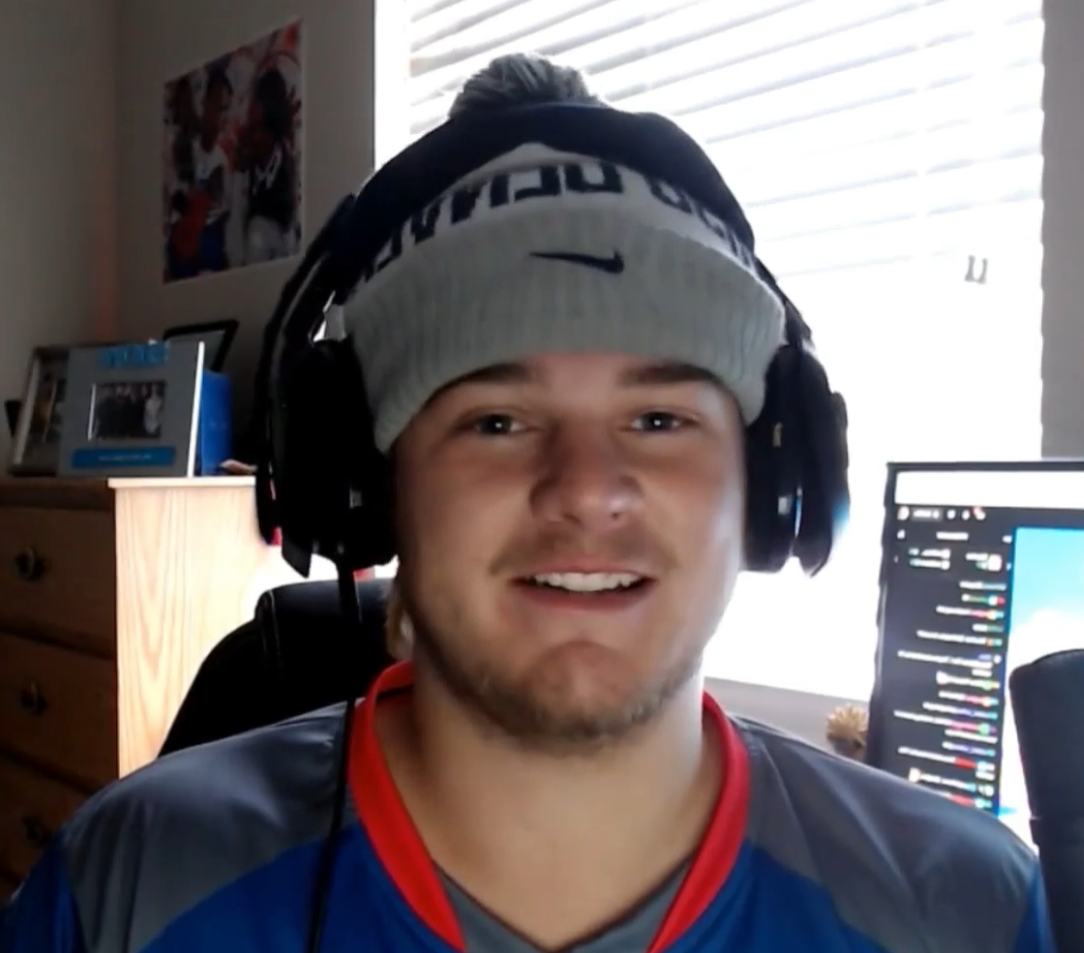 MSU Denvery student Devan Patterson playing Esports with headphones on