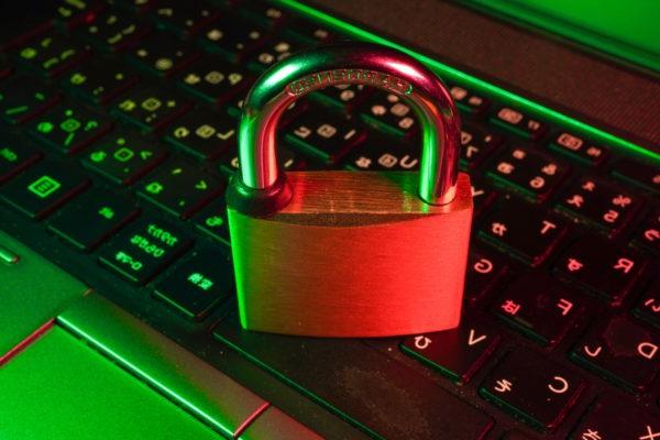 A padlock on a laptop keyboard