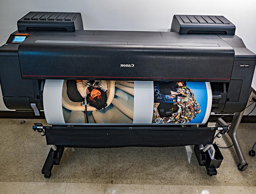 Large printer printing photographs