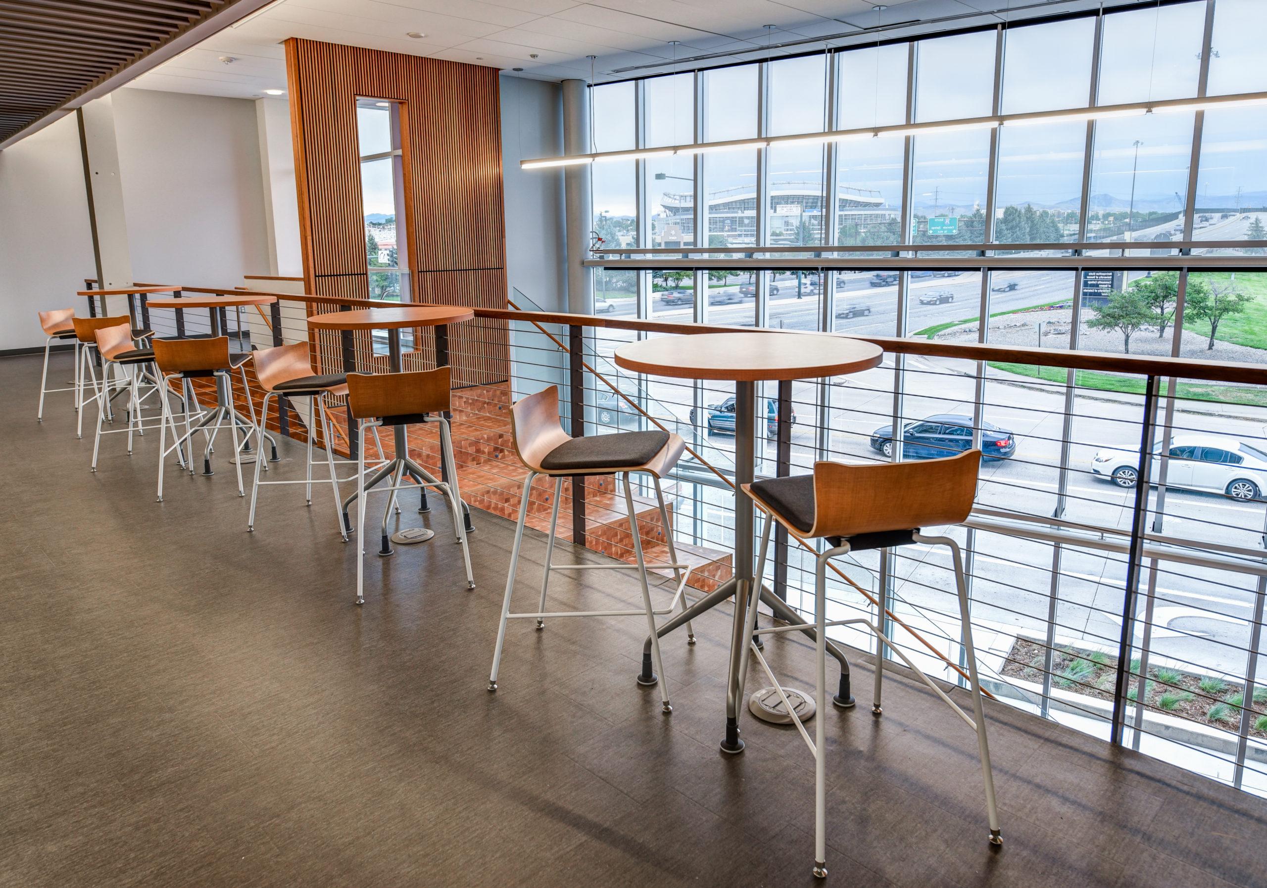 AES building hallway with hightop tables and chairs