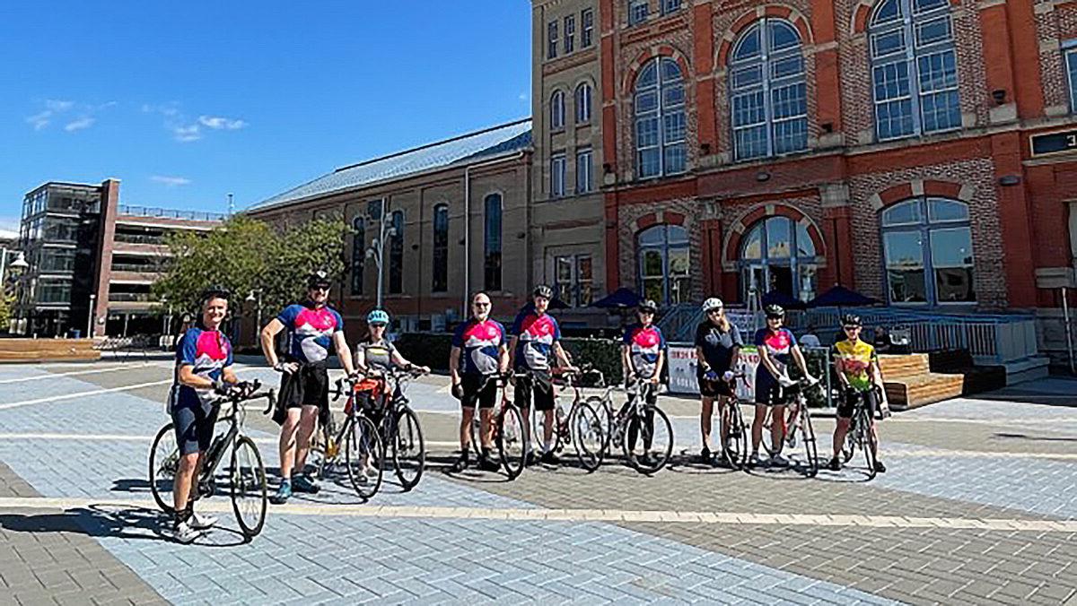 Group of bikers standing with their bikes in front of the Tivoli