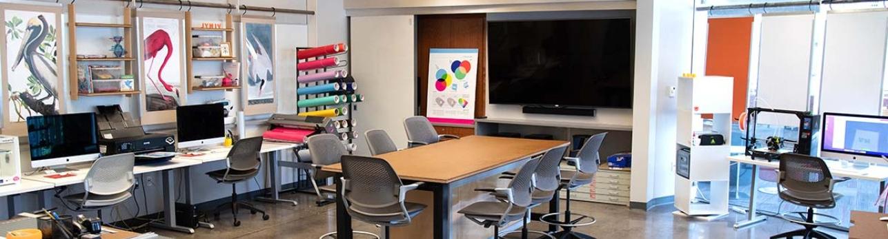 Library innovation garage space, including computers, desks and chairs