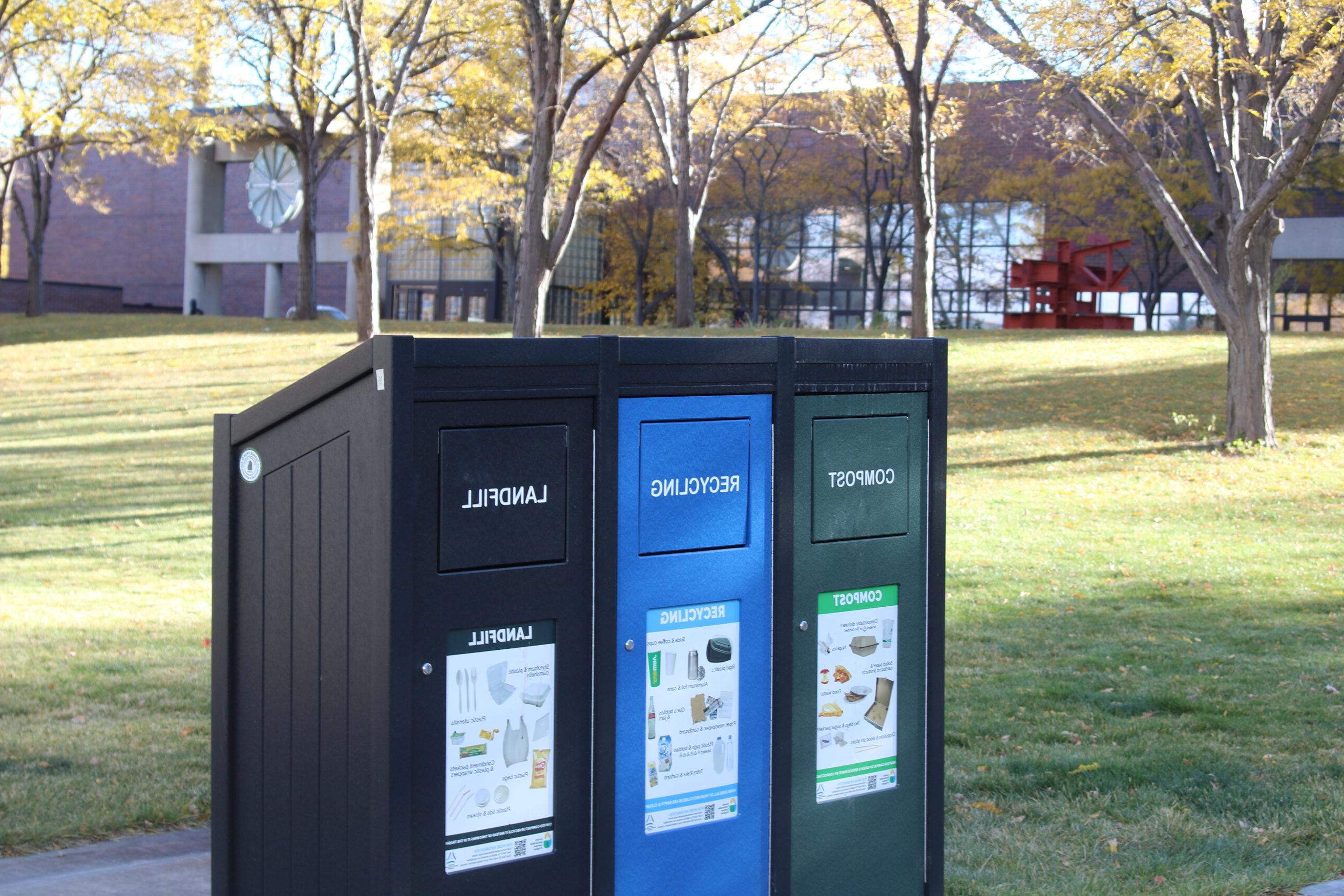 tri-compartment bin with compost, recycling, and trash