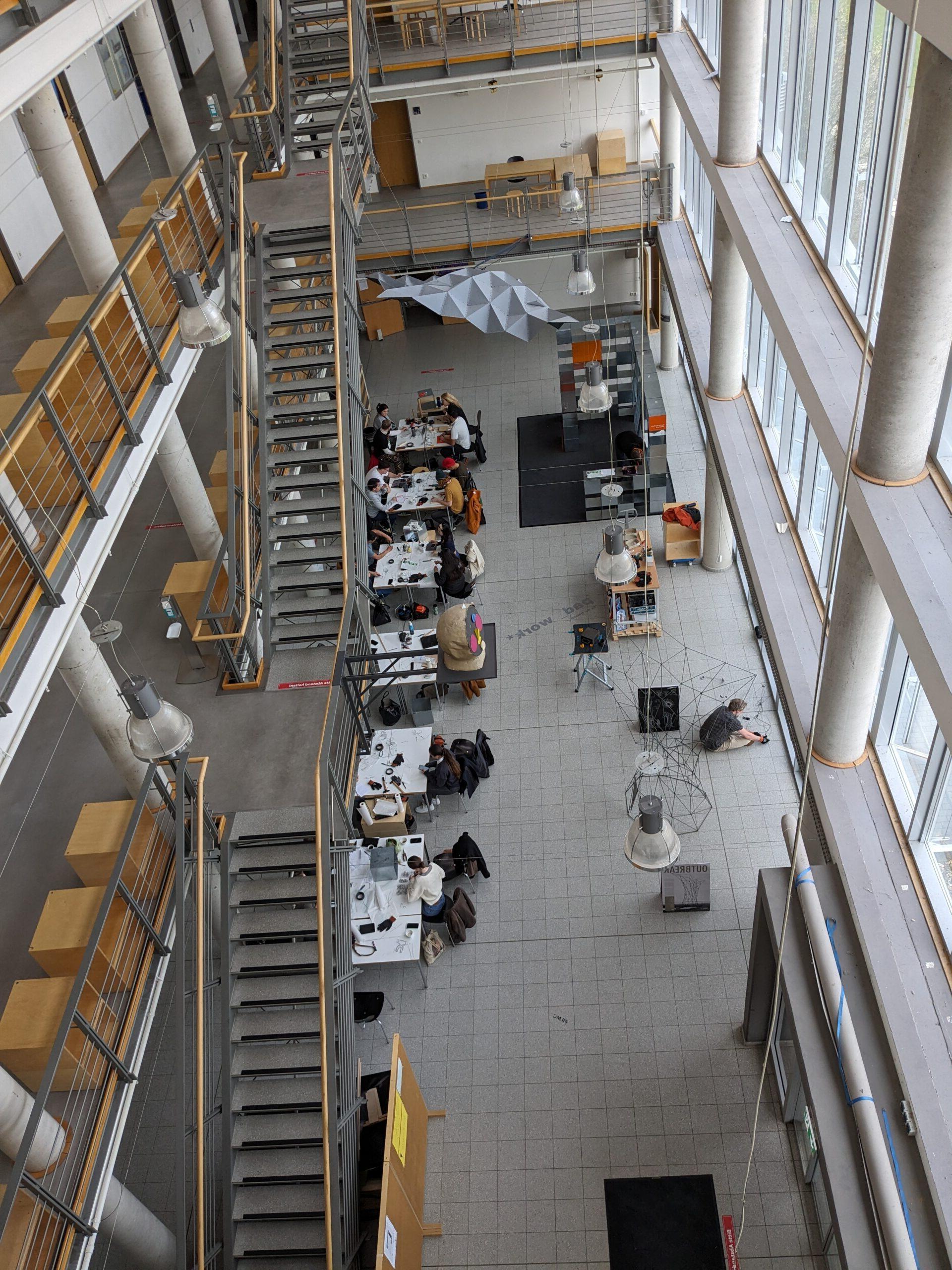 Overhead view of students working at tables