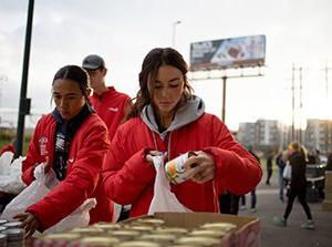 MSU Denver students Ashley Morton and Aaliyah Molina help bag food items for children in need of food assistance at the weekly Food for Thought event on Auraria Campus Friday morning, Oct. 1, 2021. Photo by Sara Hertwig