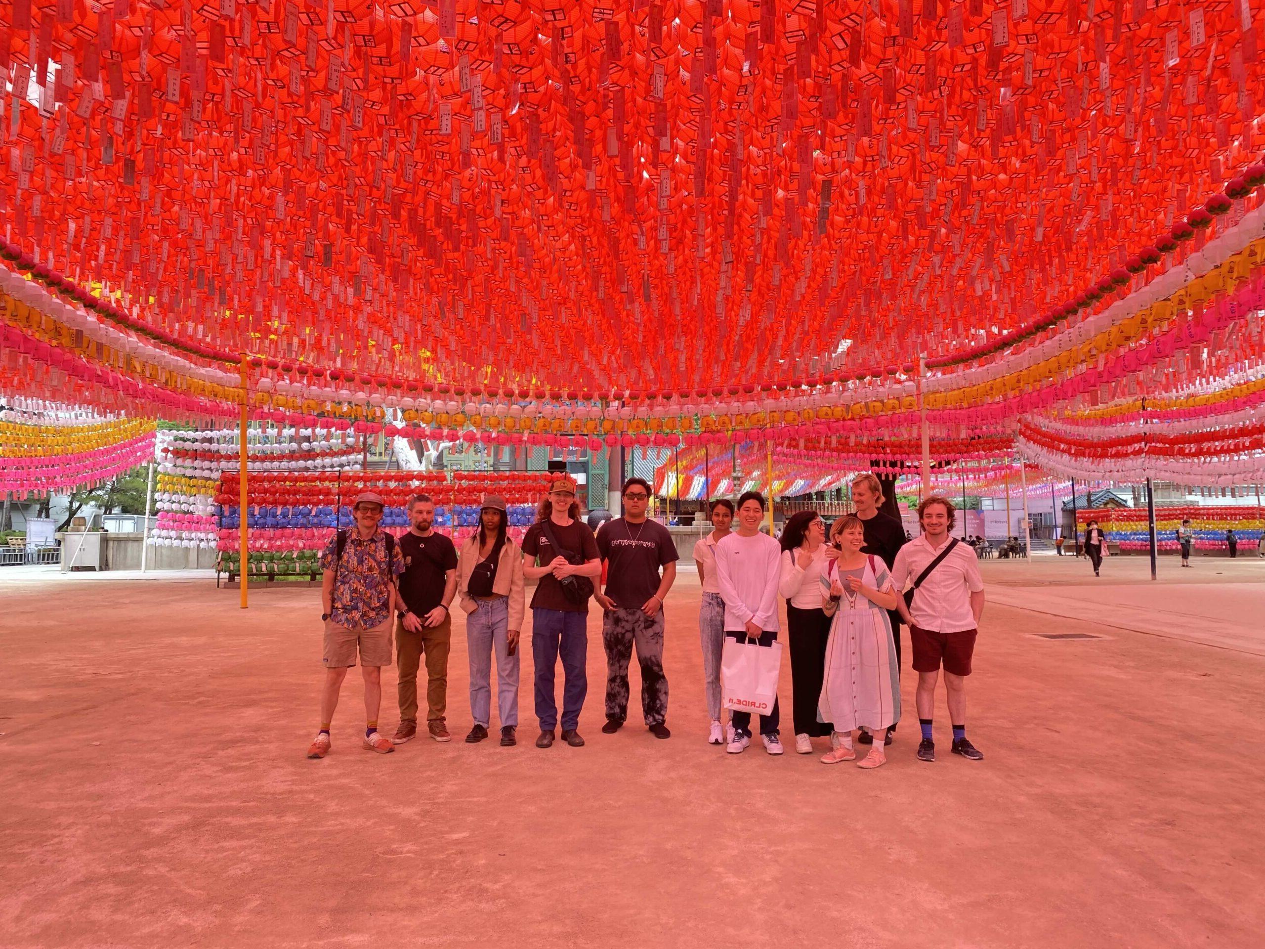 Overhead installation of red, glowing lanterns in Seoul, South Korea