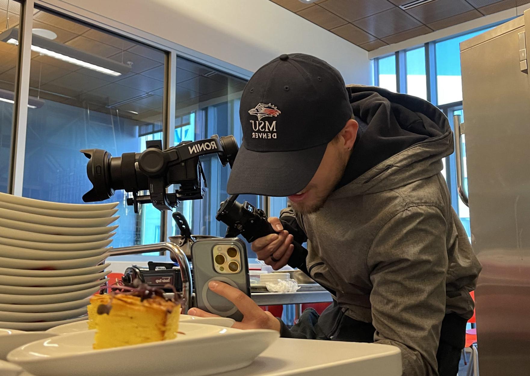 person taking pictures of food