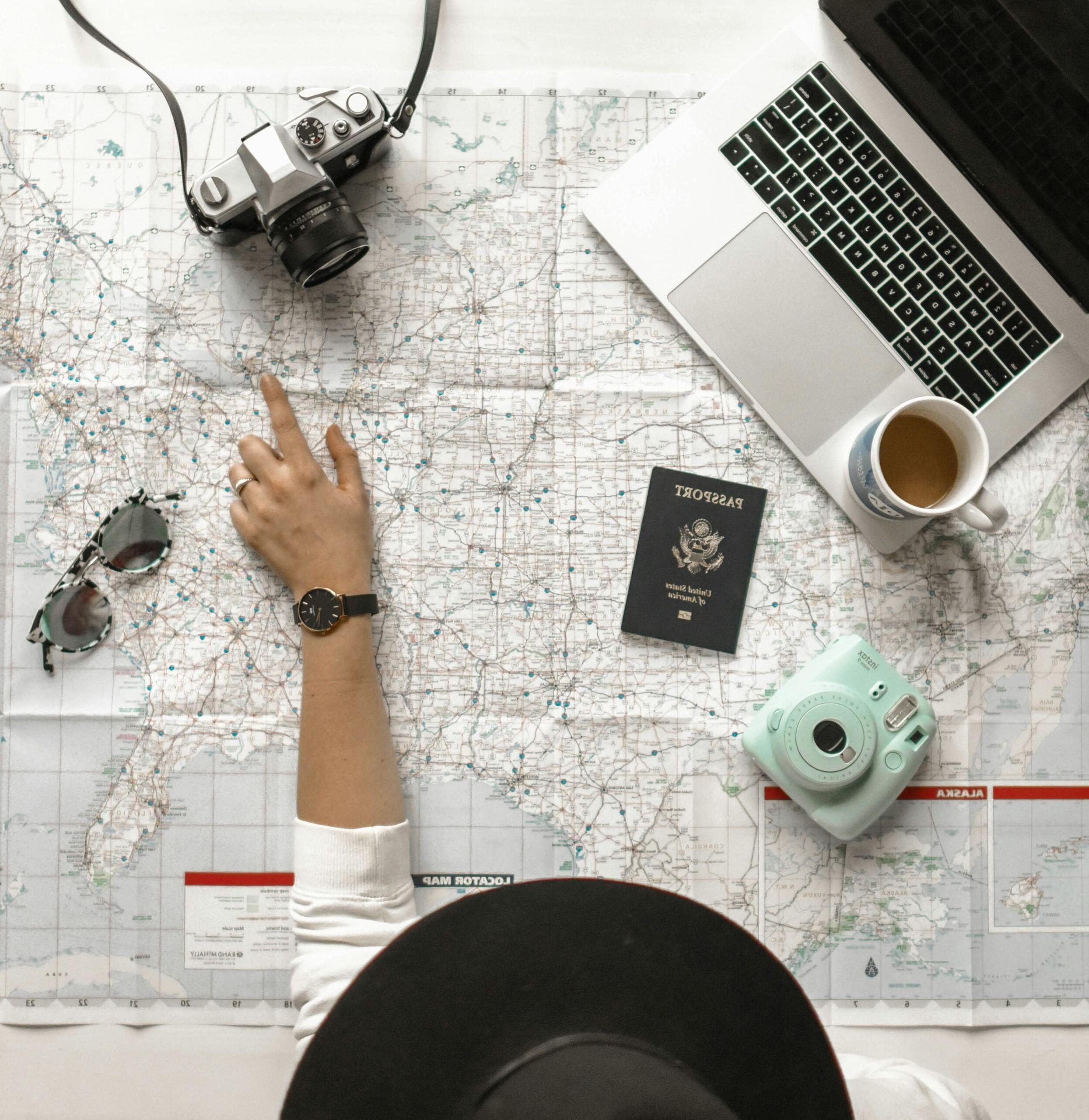 Travel items arranged on a desk